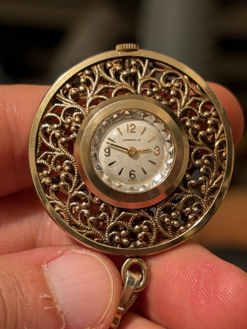 Caravelle Gold Tone Filigree Pendant Watch 37.4mm